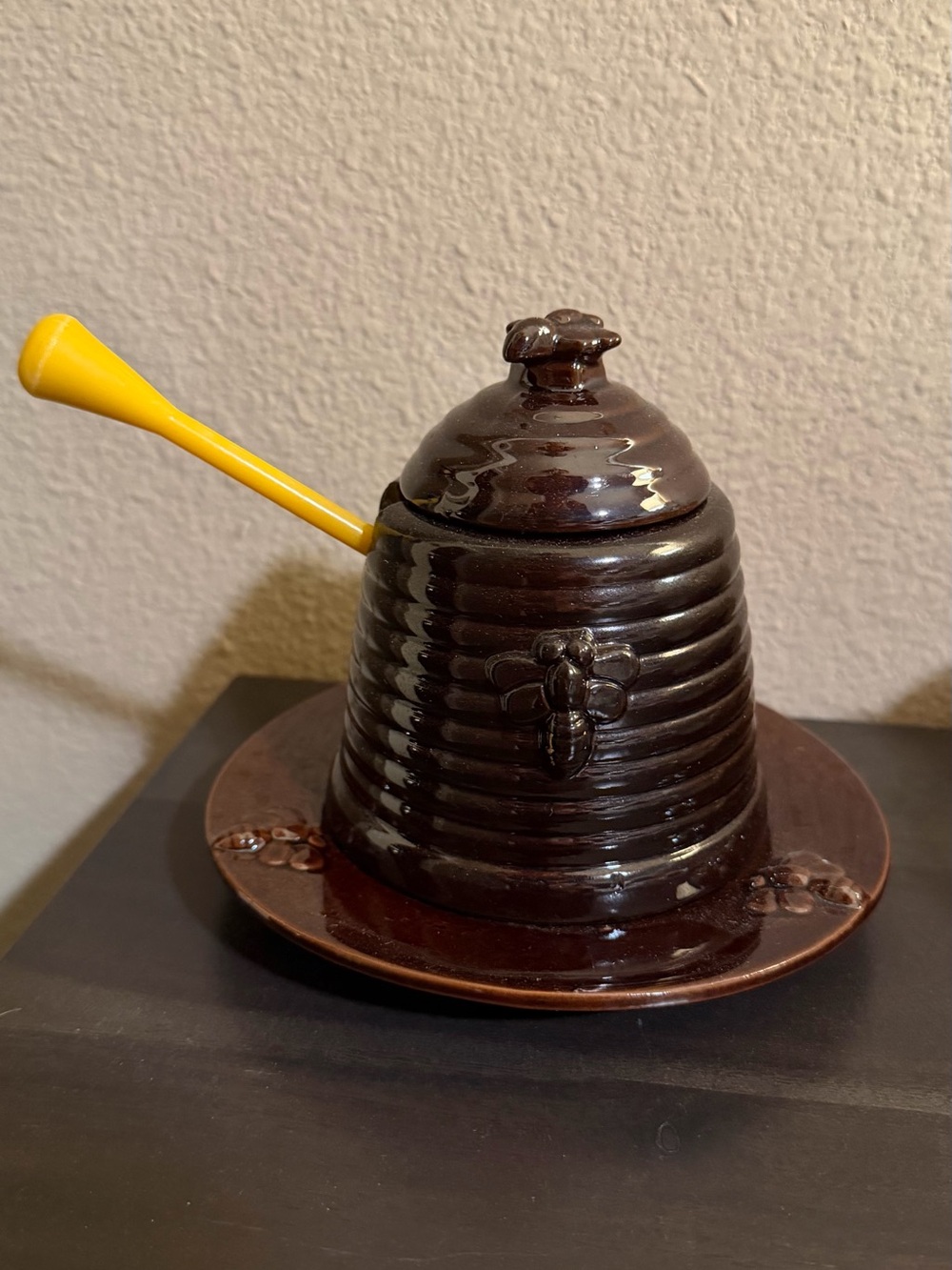 Brown Ceramic Honey Pot with Bee Motif and Yellow Dipper